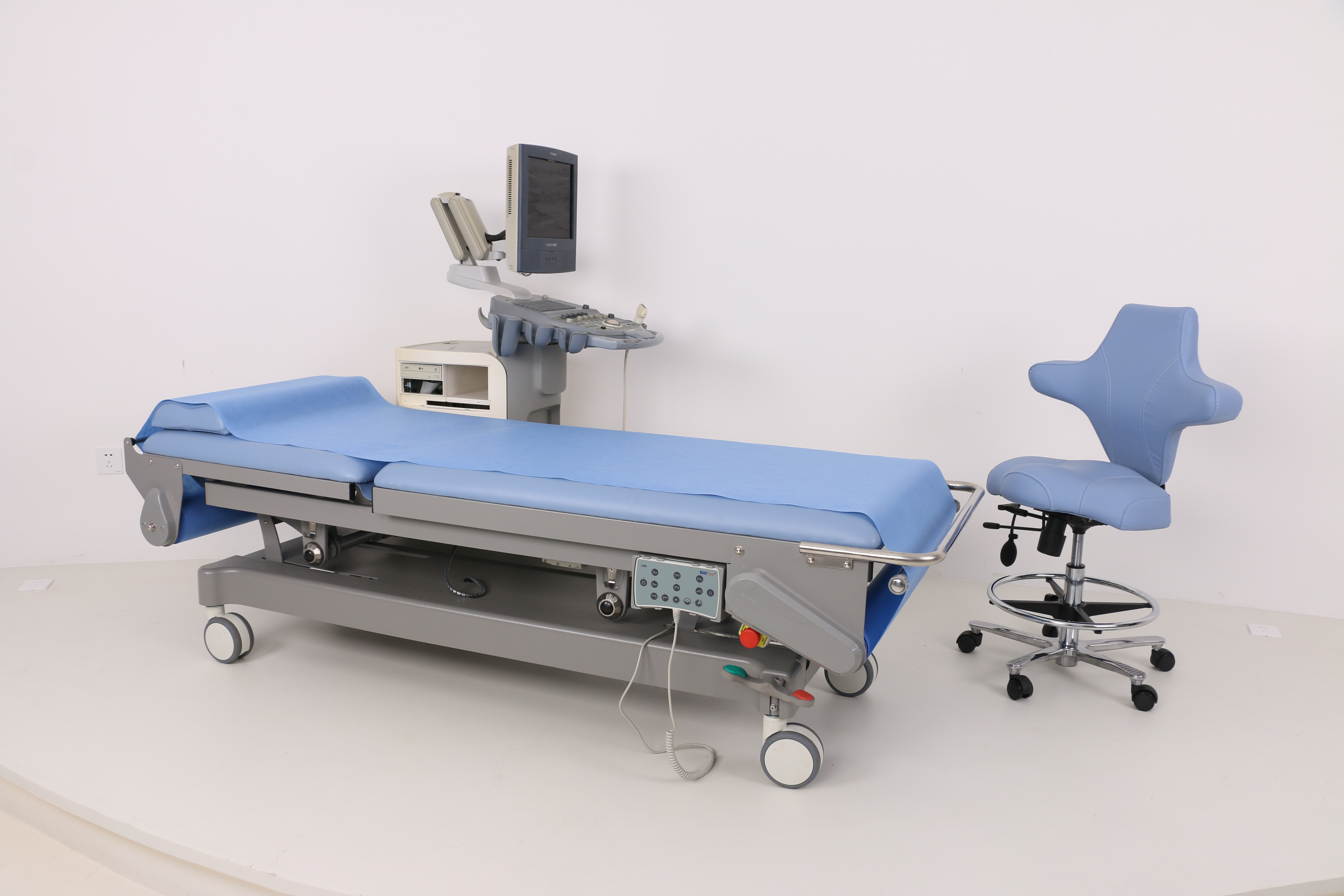 Table d'échographie de lit d'examen de changement de papier automatique électrique d'ultrason de nouvelle conception